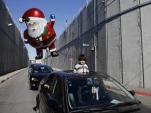 Santa Crosses Separation Wall to Bethlehem